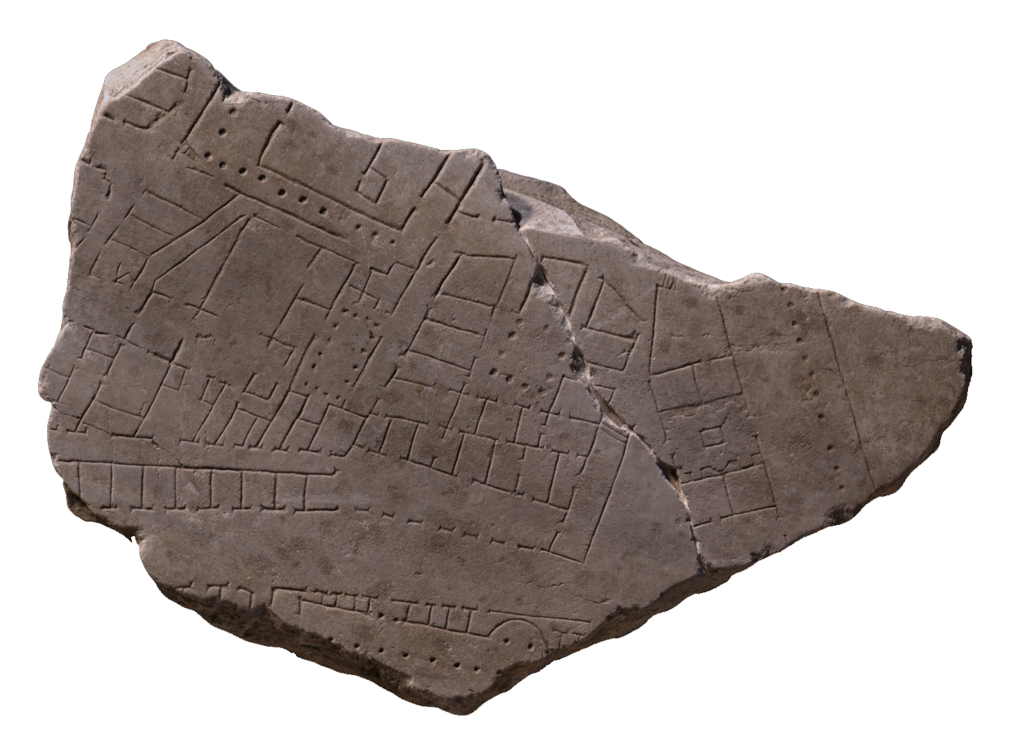A broken stone fragment with markings on in little squares, lines, and dots.