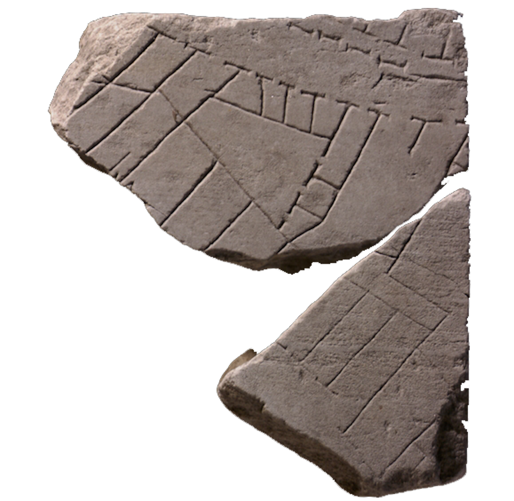 Broken stone fragments of the forma urbis. You can see the lines of roads and buildings marked on them